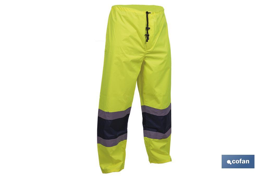 PANTALÓN DE LLUVIA DE ALTA VISIBILIDAD MODELO BELLATRIX AMARILLA Y AZUL TALLA XL