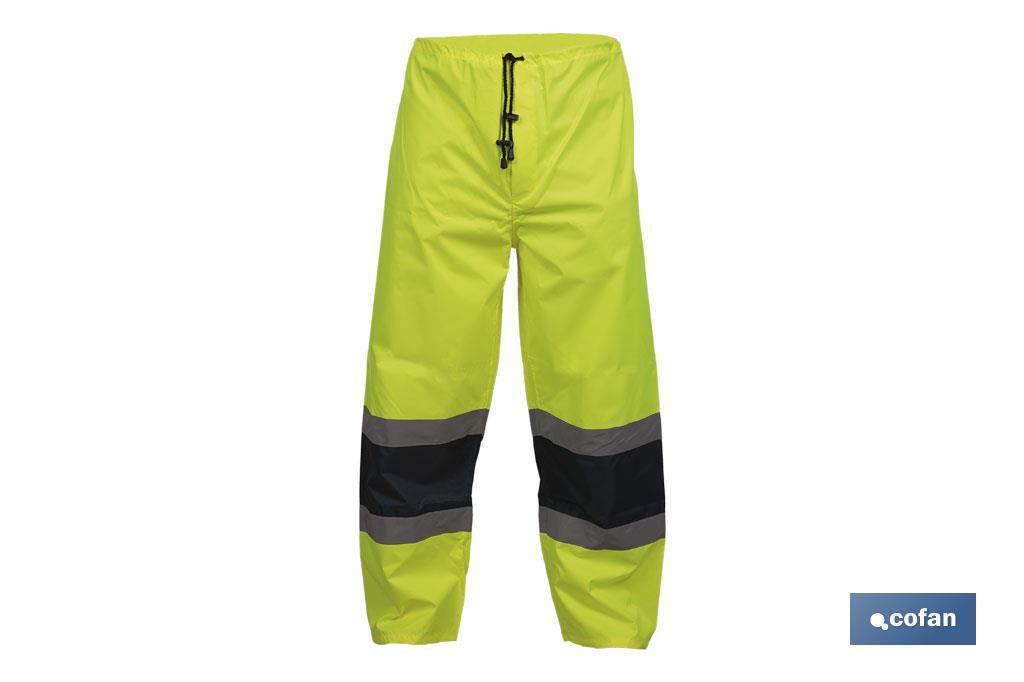 PANTALÓN DE LLUVIA DE ALTA VISIBILIDAD MODELO BELLATRIX AMARILLA Y AZUL TALLA XL